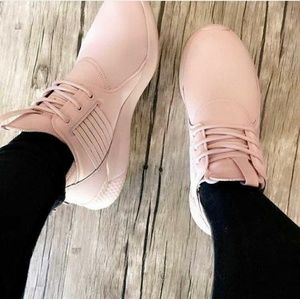 Women's blush pink Reebok shoes